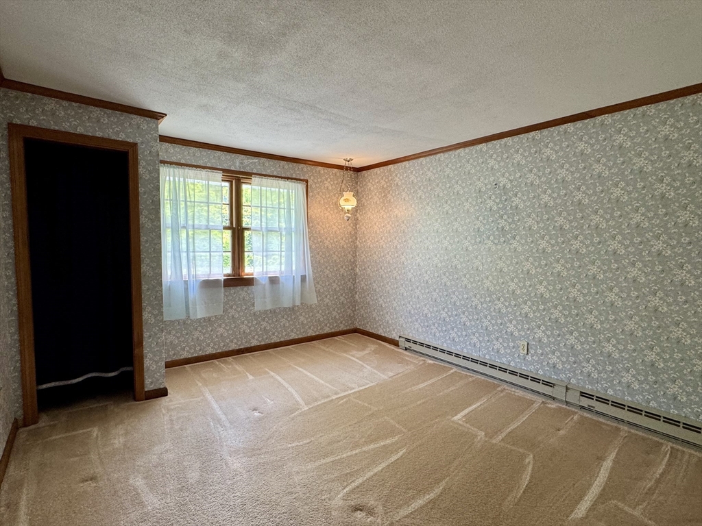 92 Clesson Brook Road Buckland, MA 01339 - Photo 23 of 38 an empty room with windows