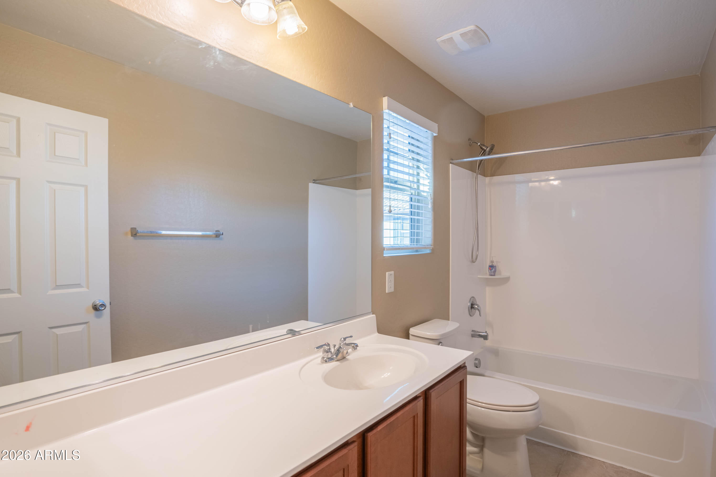 533 North Ranger Trail Gilbert, AZ 85234 - Photo 29 of 35 a bathroom with a sink a toilet and shower