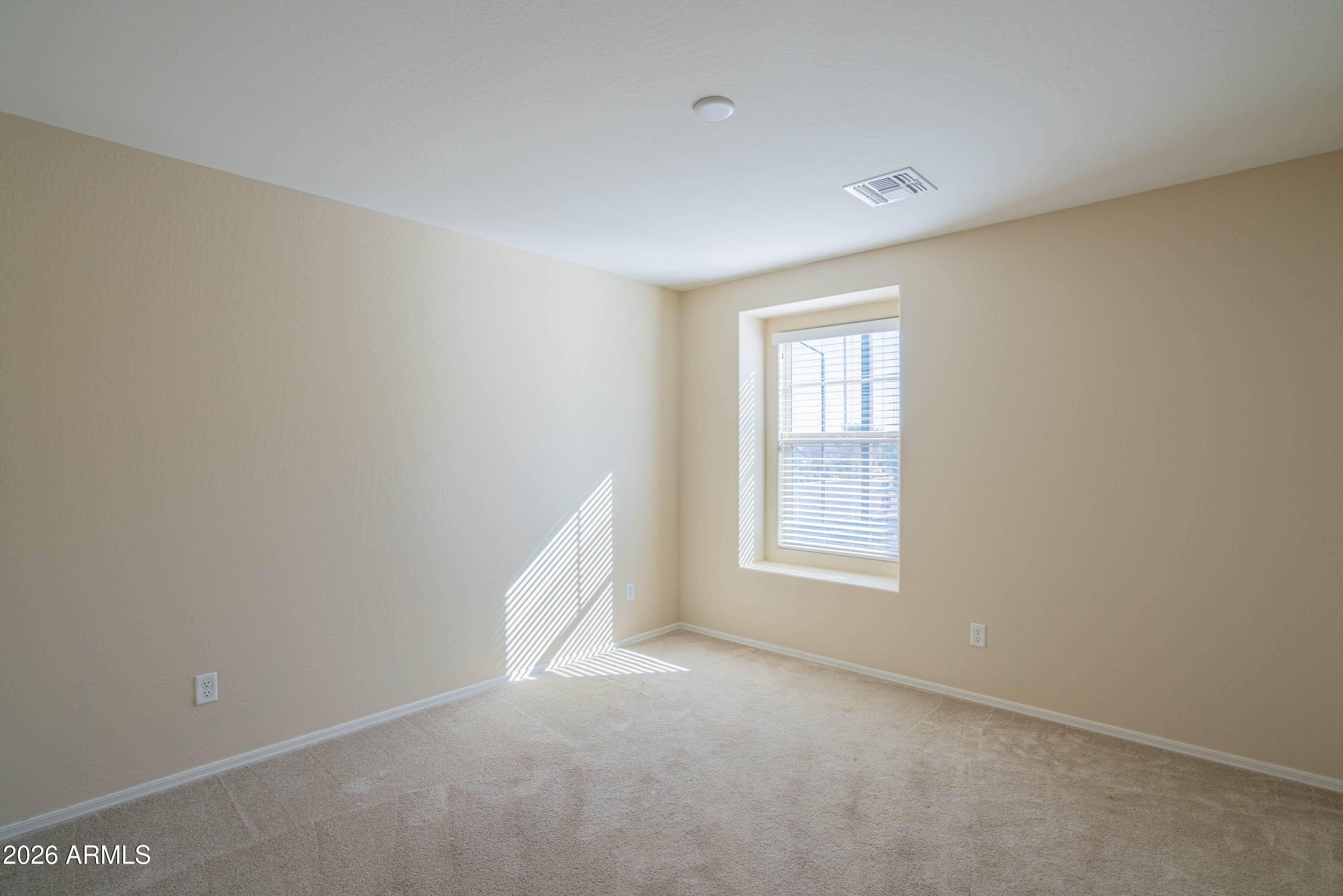 533 North Ranger Trail Gilbert, AZ 85234 - Photo 30 of 35 an empty room with a window