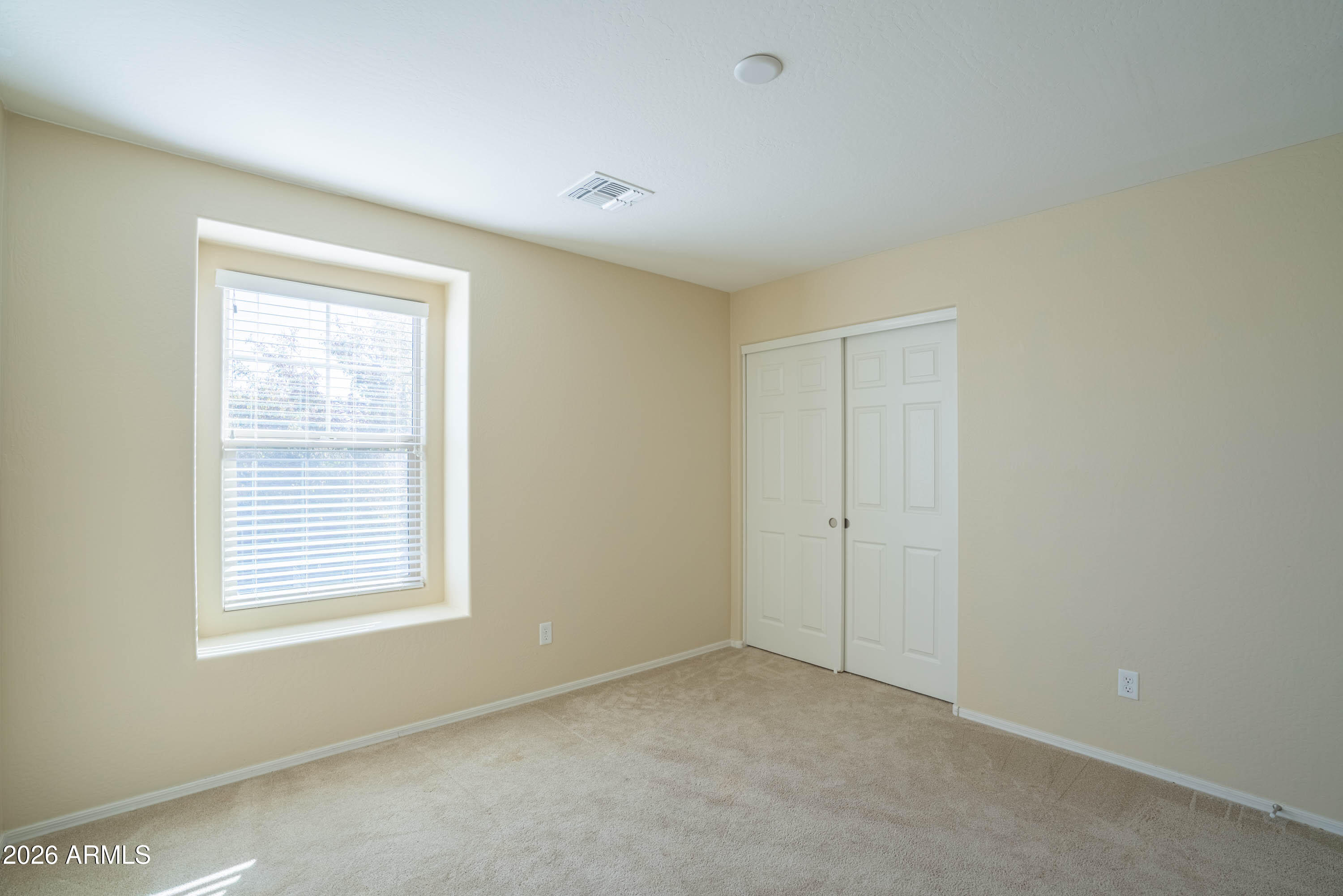 533 North Ranger Trail Gilbert, AZ 85234 - Photo 31 of 35 a view of an empty room with a window