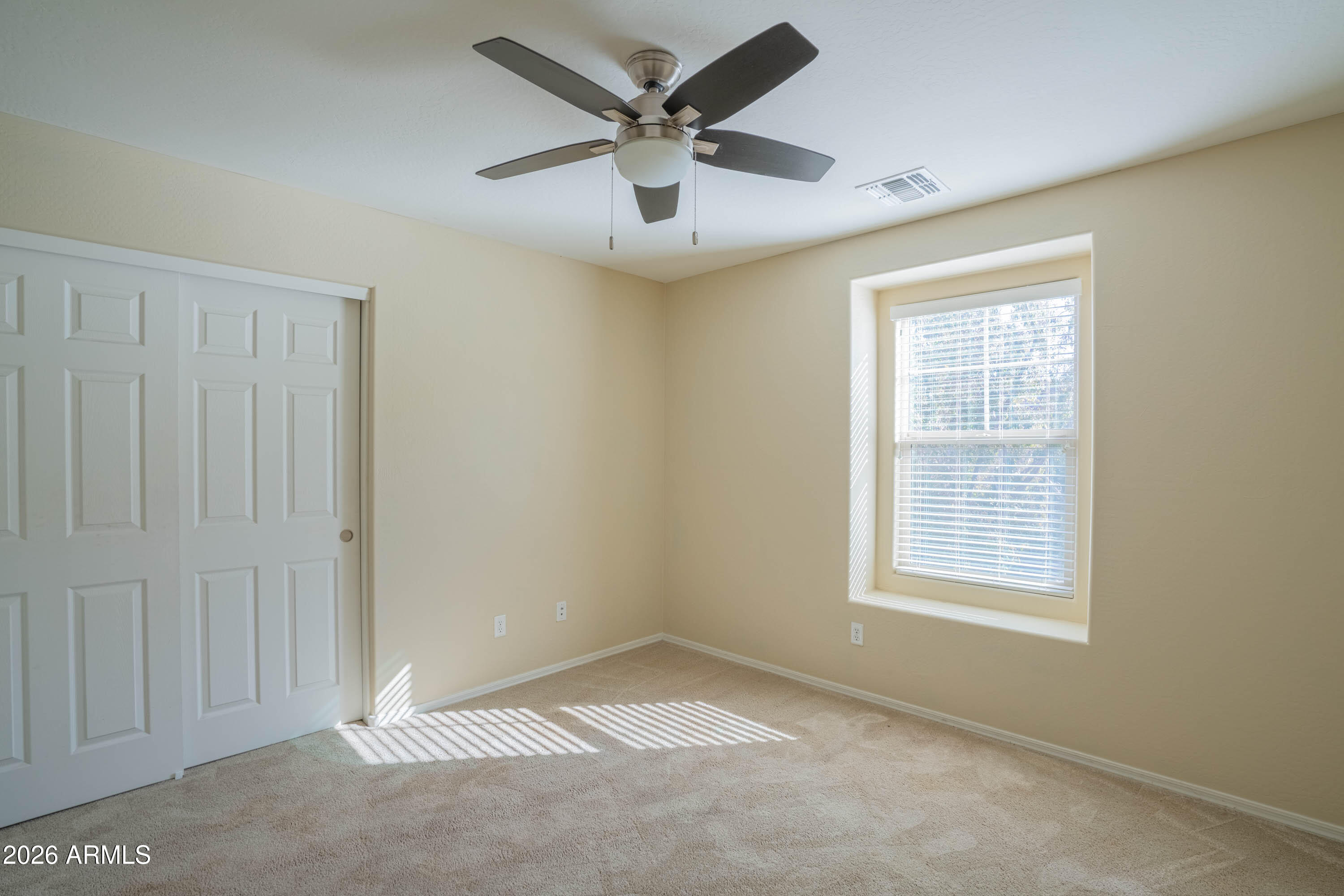 533 North Ranger Trail Gilbert, AZ 85234 - Photo 33 of 35 a view of an empty room with a window