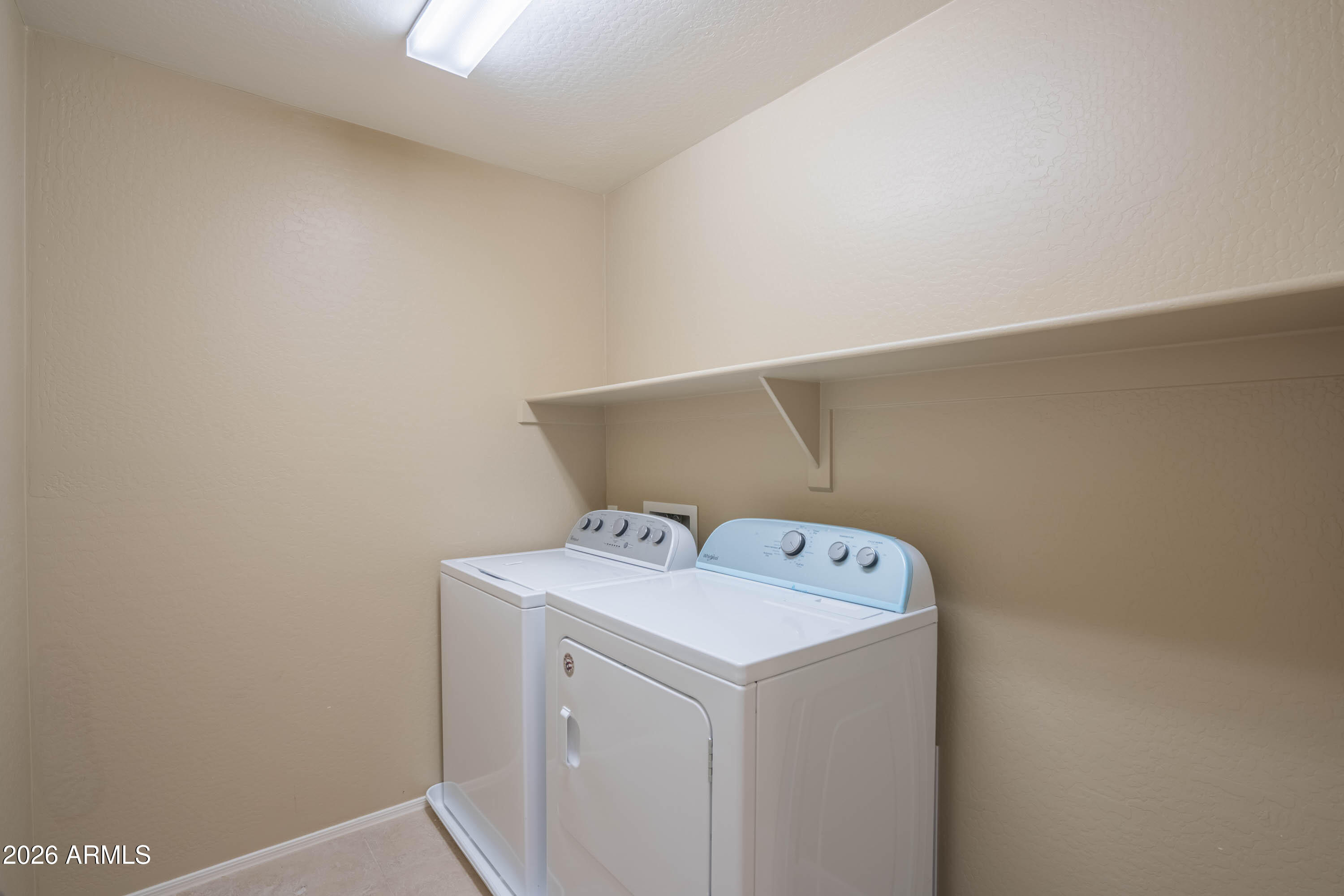 533 North Ranger Trail Gilbert, AZ 85234 - Photo 34 of 35 a utility room with dryer and washer