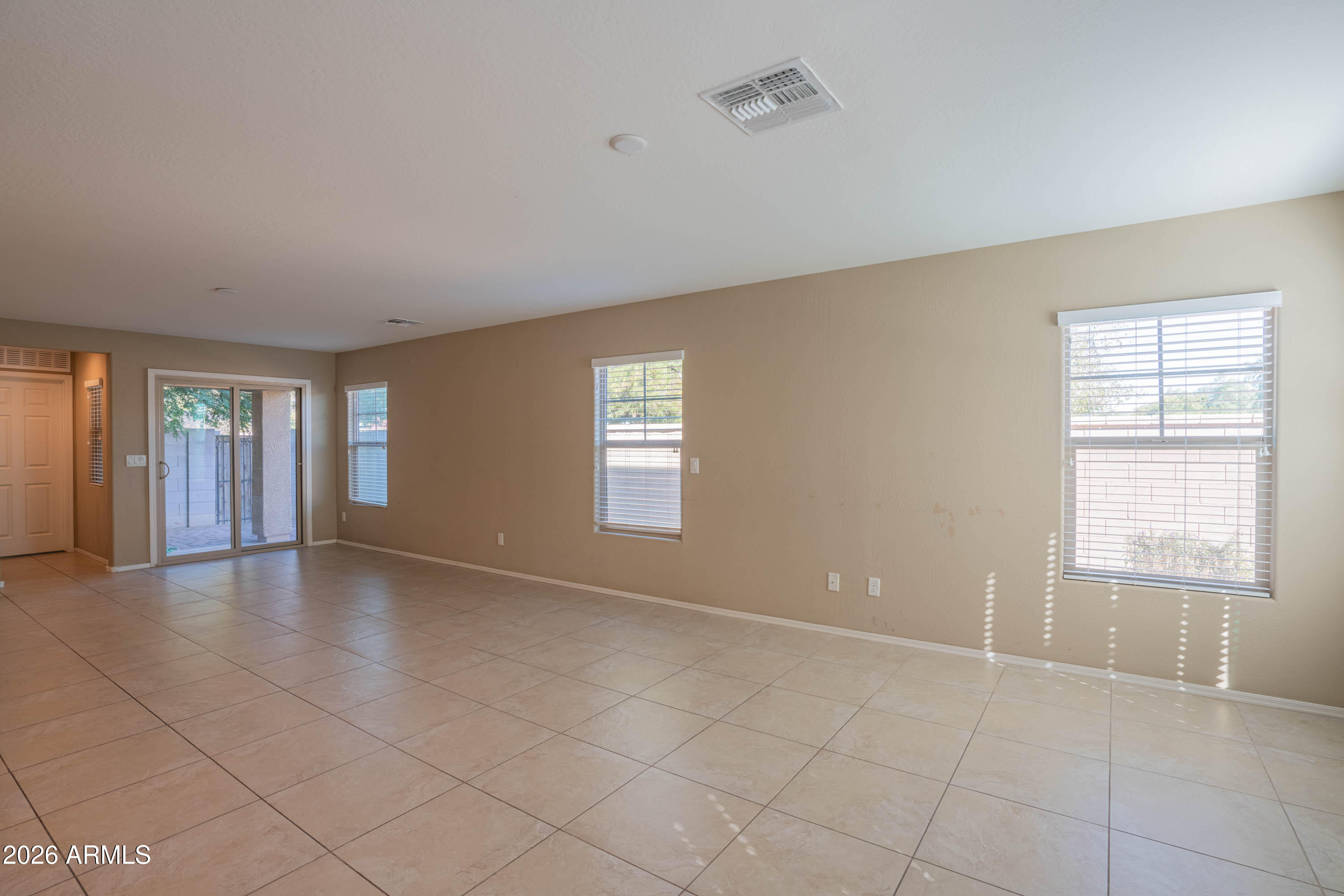 533 North Ranger Trail Gilbert, AZ 85234 - Photo 4 of 35 a view of an empty room with a window