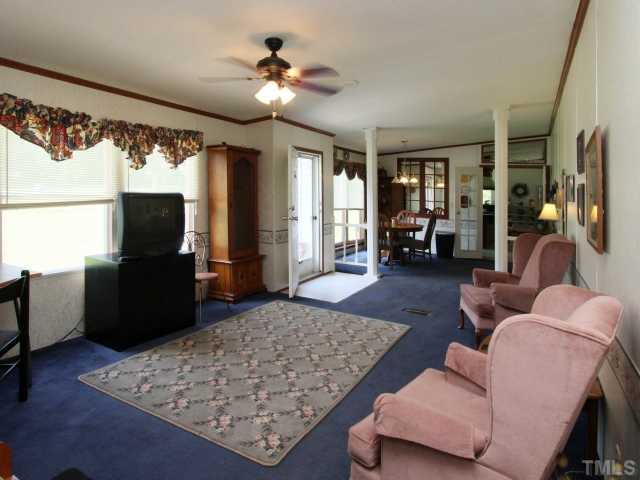 4902 West Ten Road Efland, NC 27243 - Photo 5 of 25 a living room with furniture rug and window