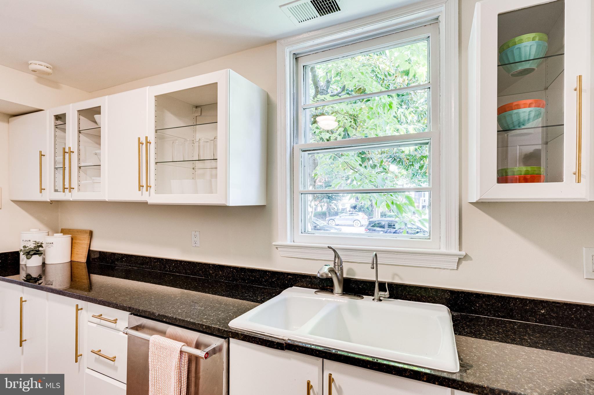 329 11th Street Southeast Washington, DC 20003 - Photo 11 of 49 a kitchen with a sink and a window