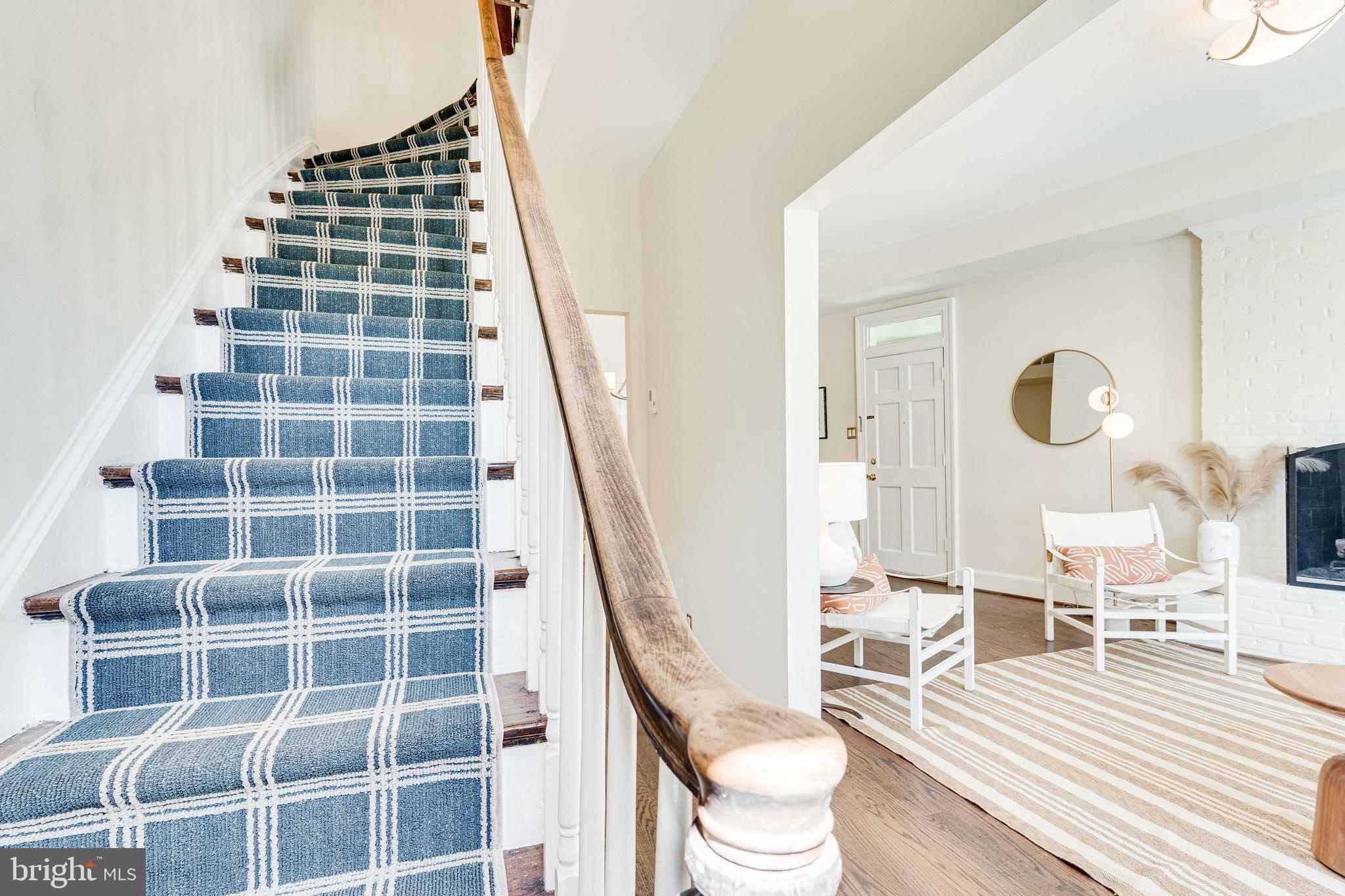 329 11th Street Southeast Washington, DC 20003 - Photo 17 of 49 a view of a livingroom with wooden floor and a large window