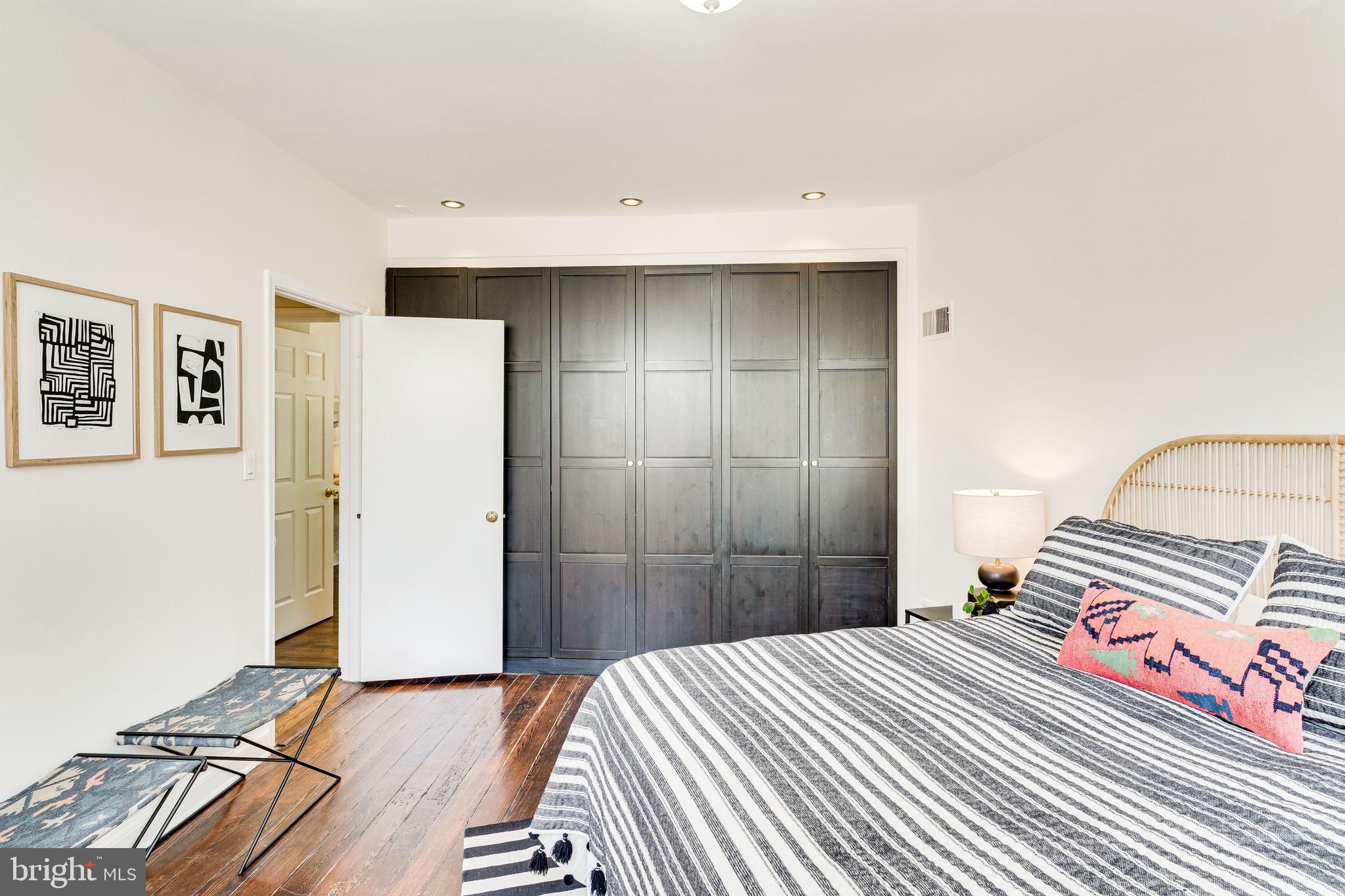329 11th Street Southeast Washington, DC 20003 - Photo 20 of 49 a bedroom with a bed and a sink