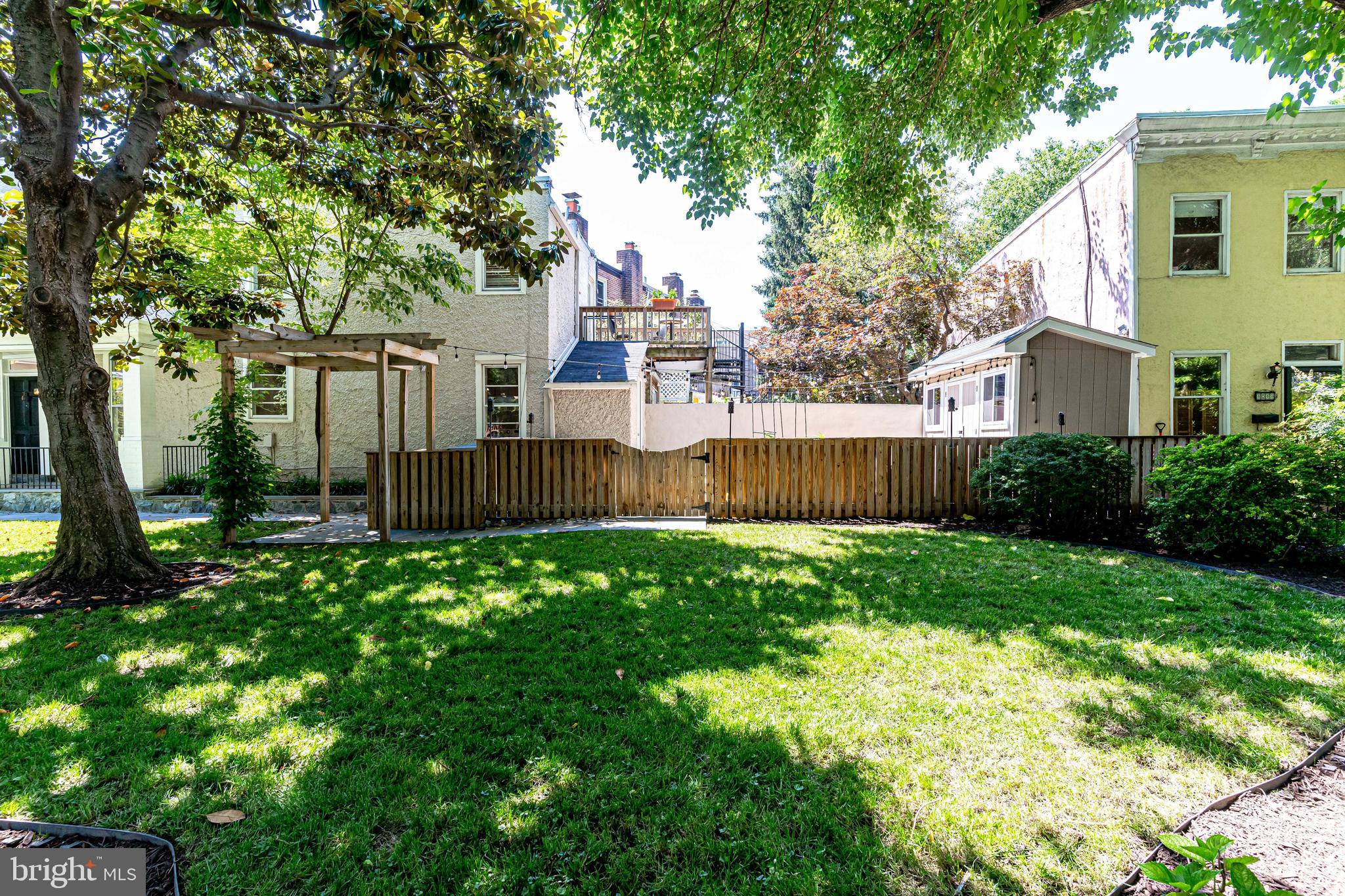329 11th Street Southeast Washington, DC 20003 - Photo 34 of 49 a view of a house with a yard