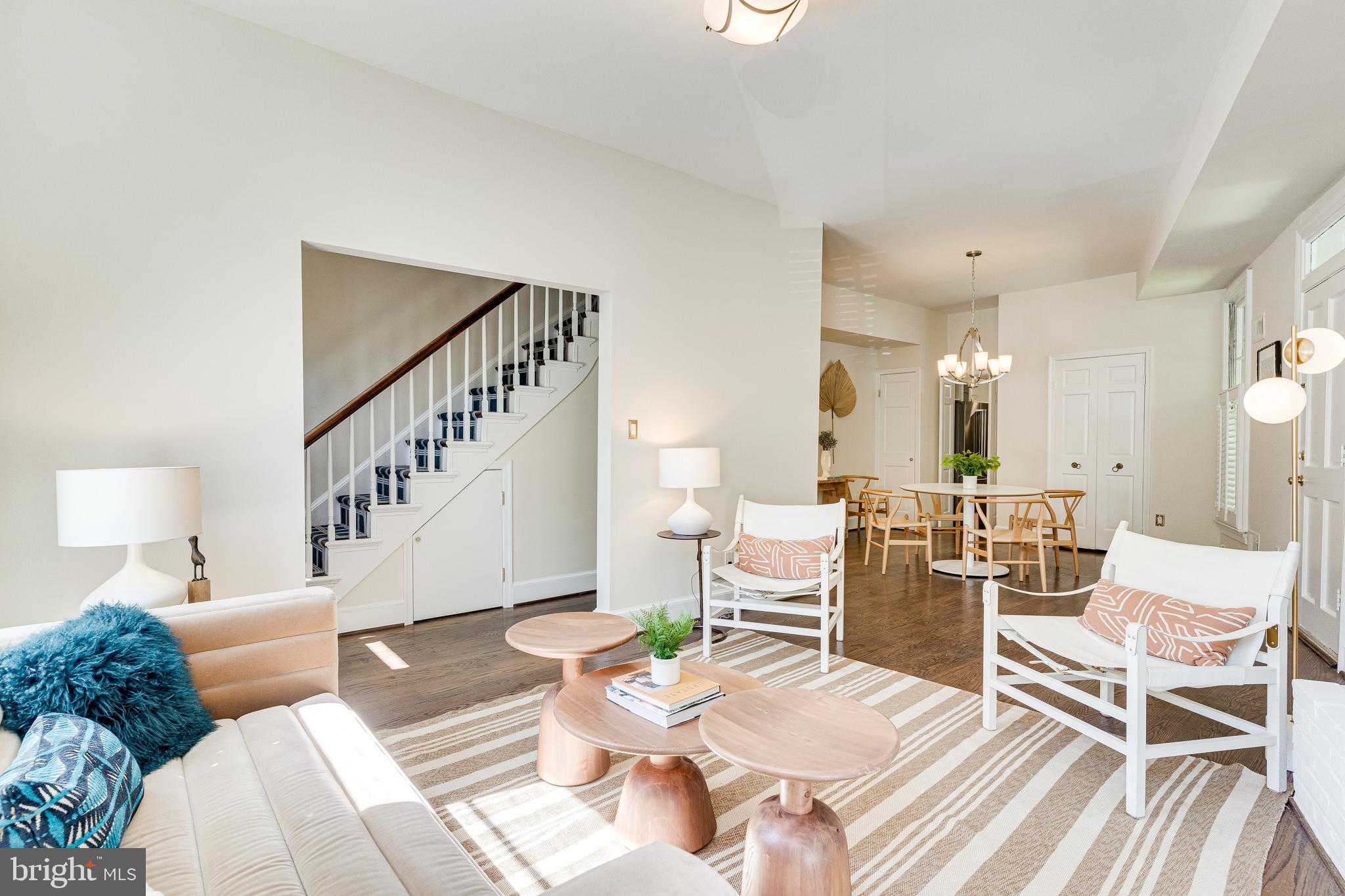 329 11th Street Southeast Washington, DC 20003 - Photo 6 of 49 a living room with furniture and wooden floor