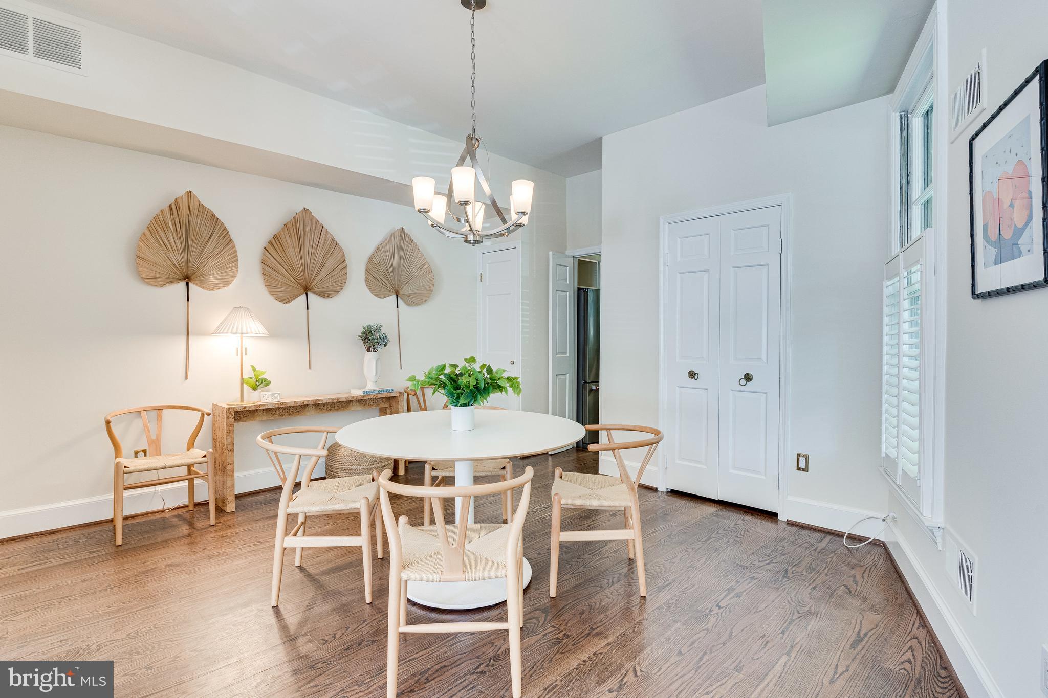 329 11th Street Southeast Washington, DC 20003 - Photo 7 of 49 a view of a dining room with furniture and chandelier