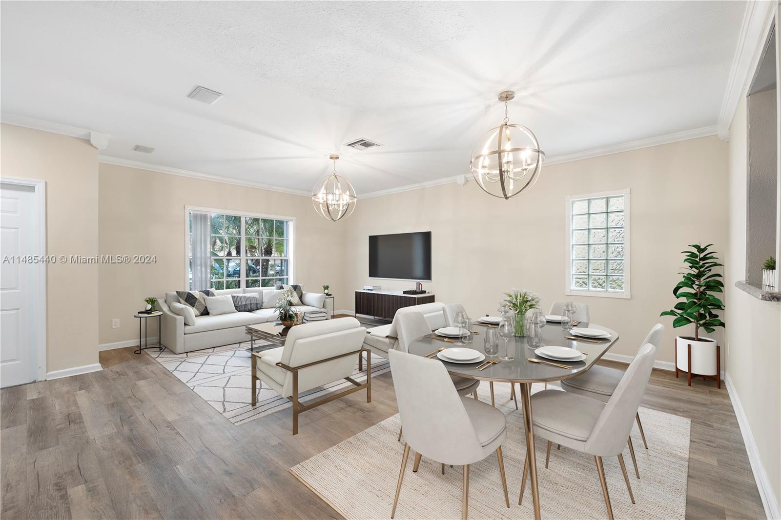 16225 Emerald Cove Road, Unit 16225 Weston, FL 33331 - Photo 1 of 26 a living room with fireplace furniture and a flat screen tv