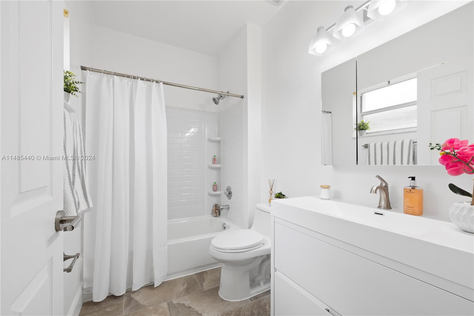 16225 Emerald Cove Road, Unit 16225 Weston, FL 33331 - Photo 15 of 26 a bathroom with a sink toilet tub and shower