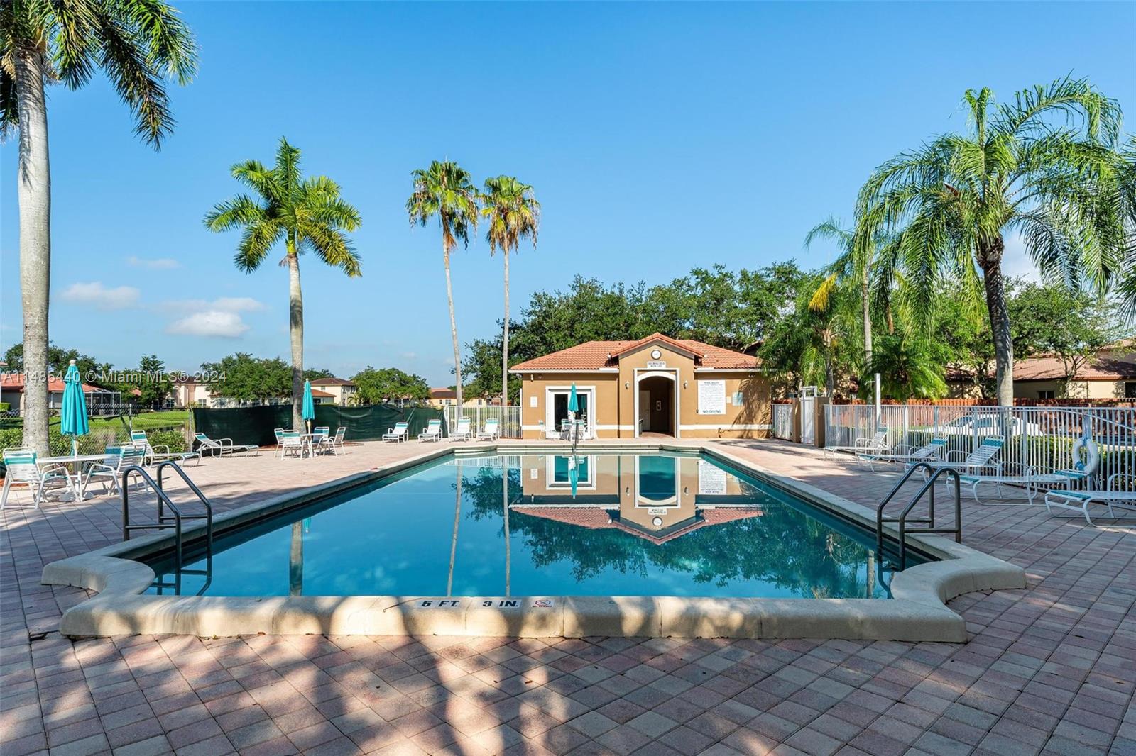 16225 Emerald Cove Road, Unit 16225 Weston, FL 33331 - Photo 22 of 26 a view of a house with a yard patio and swimming pool