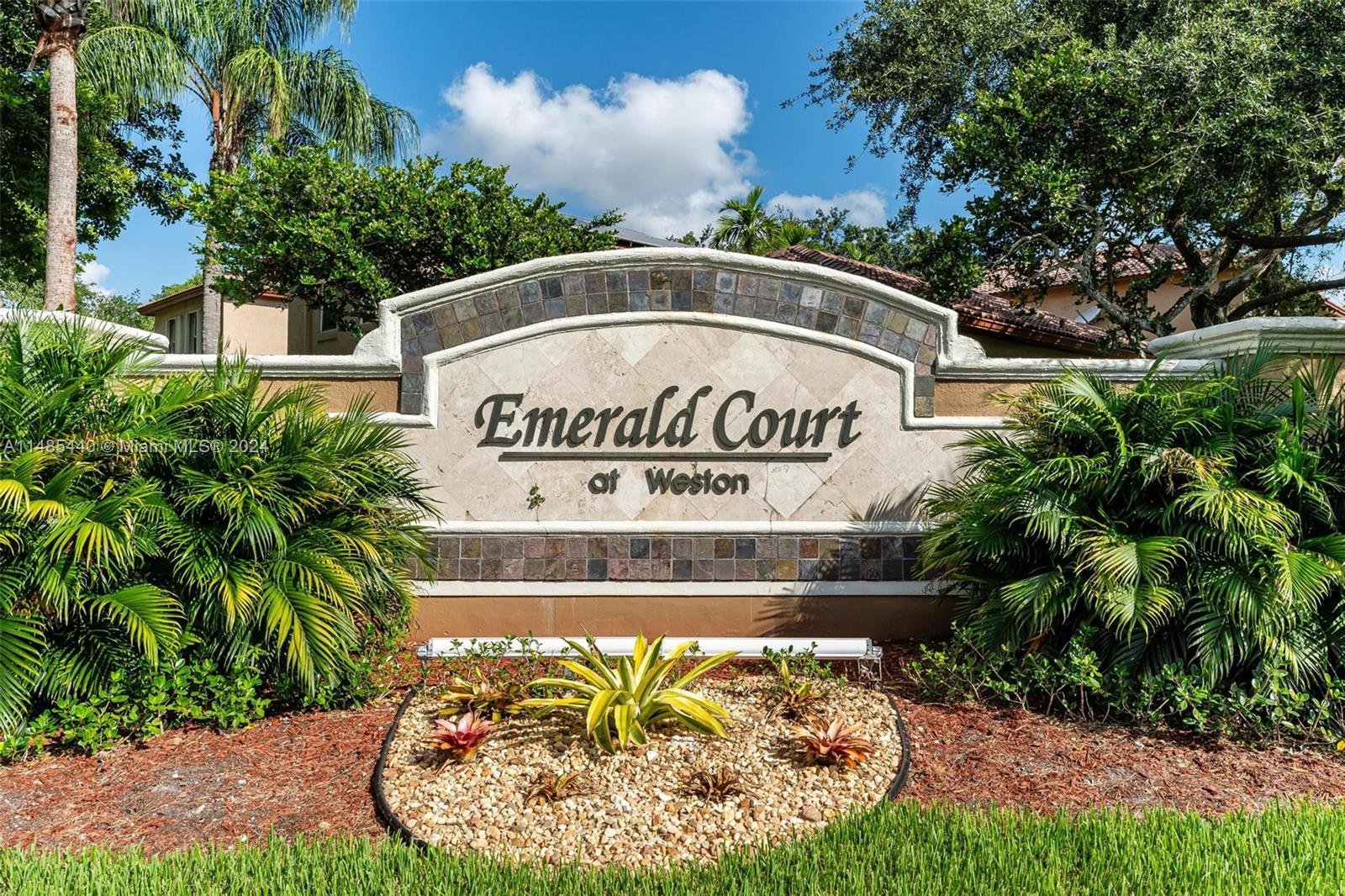 16225 Emerald Cove Road, Unit 16225 Weston, FL 33331 - Photo 26 of 26 a sign on the side of the road