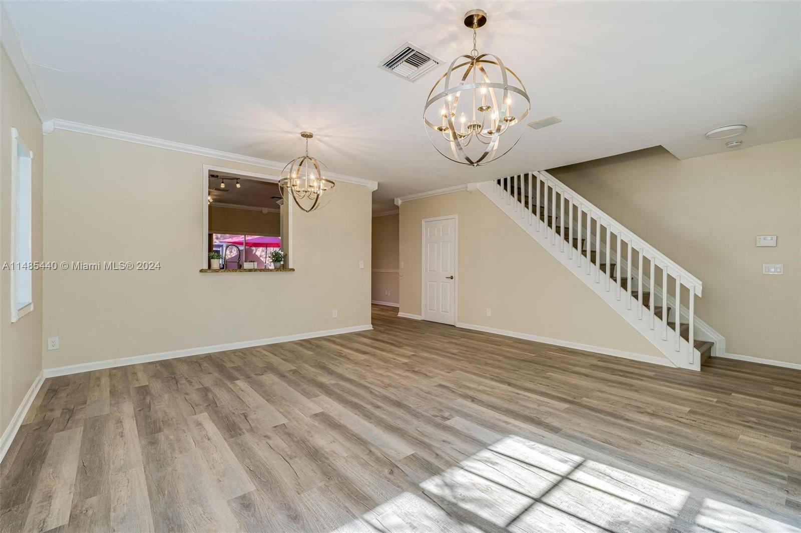 16225 Emerald Cove Road, Unit 16225 Weston, FL 33331 - Photo 3 of 26 a view of an entryway with wooden floor