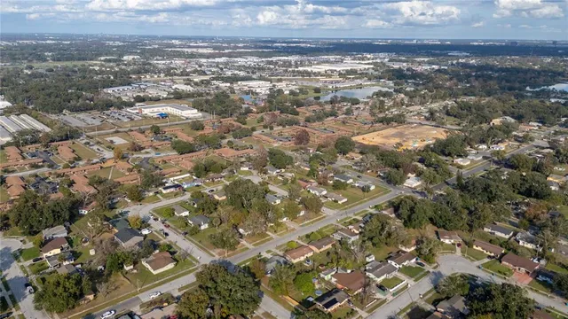 an aerial view of residential house and green space
