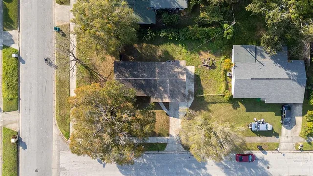 an aerial view of residential house with outdoor space