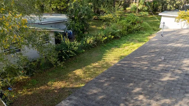 a view of a lake with a building in the background