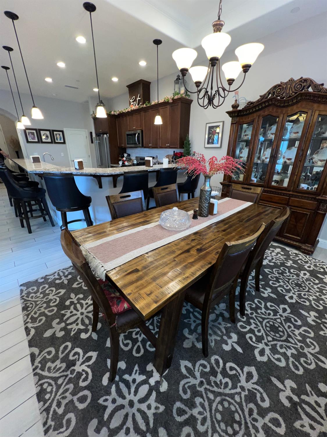 889 Coloma Place Madera, CA 93637 - Photo 11 of 61 a view of a dining room with furniture