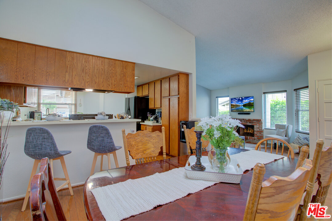 6397 Pine Falls Trail Riverside, CA 92509 - Photo 6 of 14 a living room with furniture a dining table and a potted plant