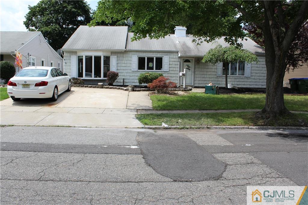 14 Kenmore Road Edison, NJ 08817 - Photo 1 of 21 a front view of a house with garden