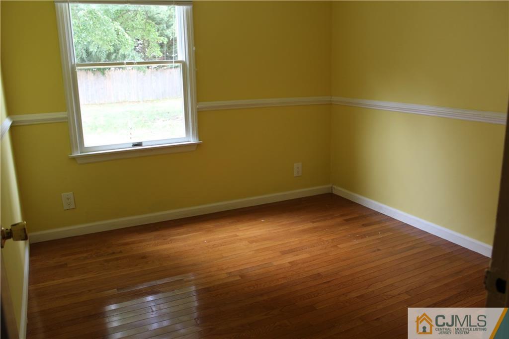 14 Kenmore Road Edison, NJ 08817 - Photo 13 of 21 an empty room with a window
