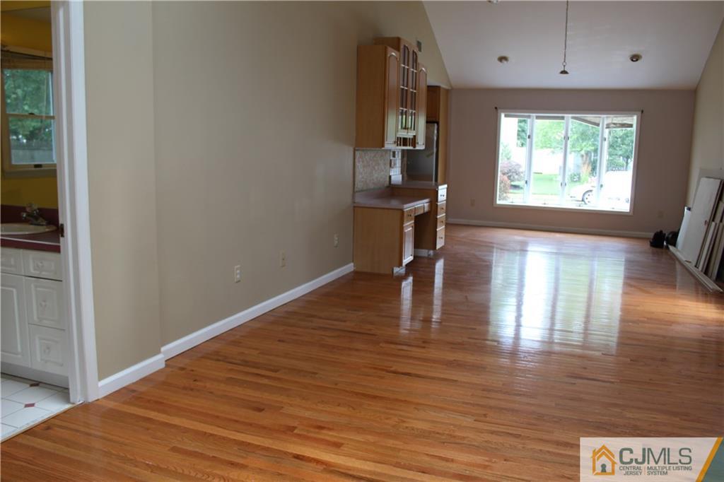 14 Kenmore Road Edison, NJ 08817 - Photo 18 of 21 a view of empty room with wooden floor