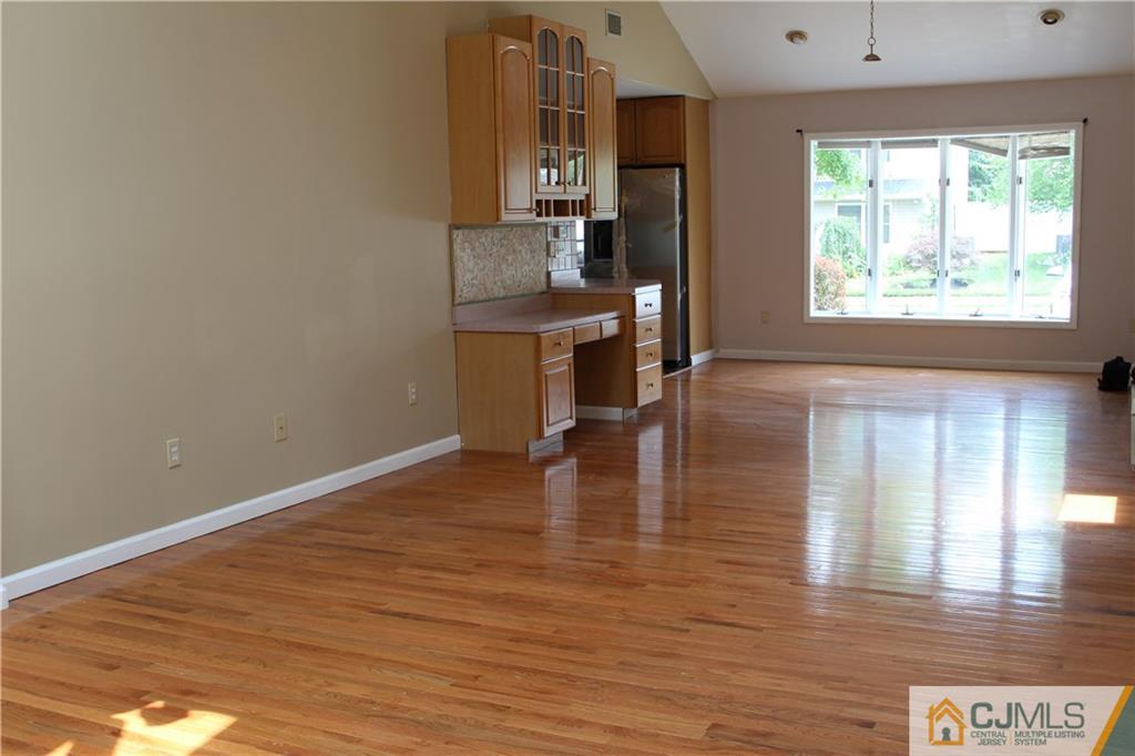 14 Kenmore Road Edison, NJ 08817 - Photo 8 of 21 a view of a kitchen with a sink and dishwasher wooden floor