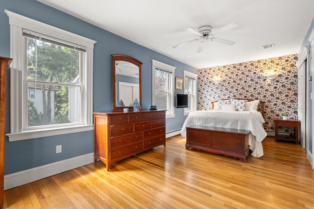 52 Lewis Avenue Arlington, MA 02474 - Photo 16 of 40 a living room with furniture and a large window