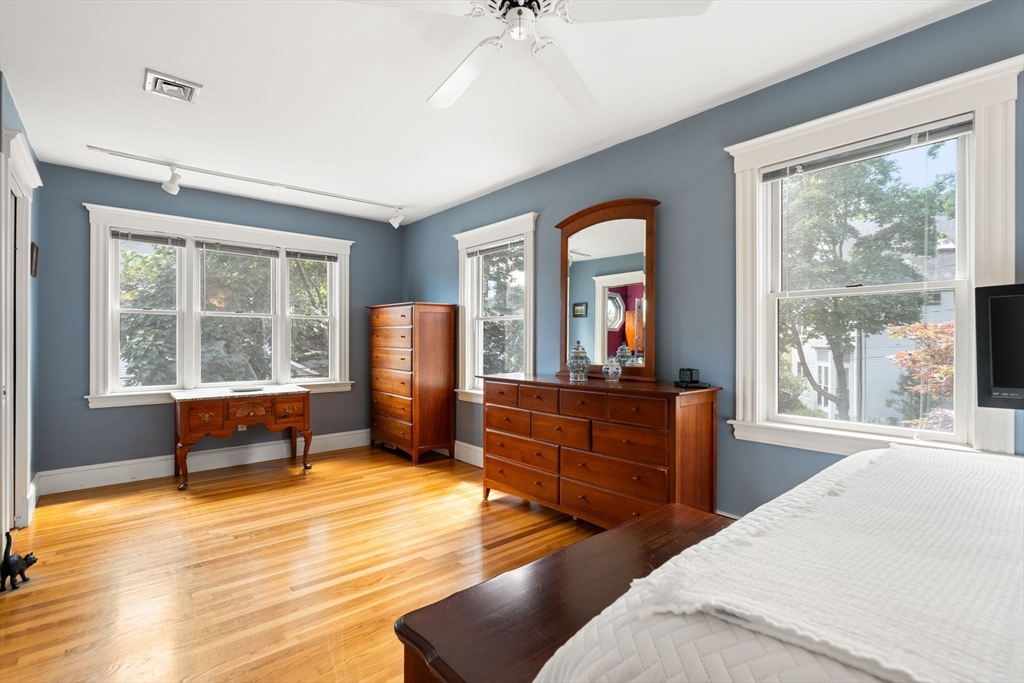52 Lewis Avenue Arlington, MA 02474 - Photo 18 of 40 a bedroom with furniture and a window
