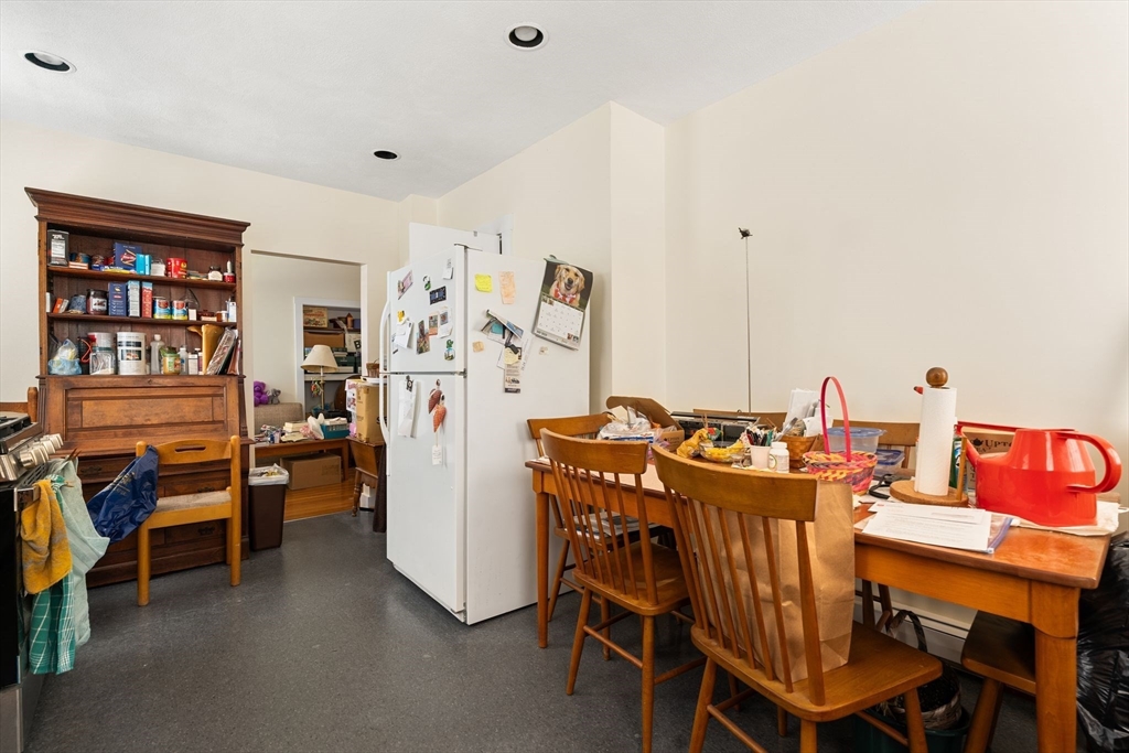 52 Lewis Avenue Arlington, MA 02474 - Photo 31 of 40 a view of a dining room with furniture and window