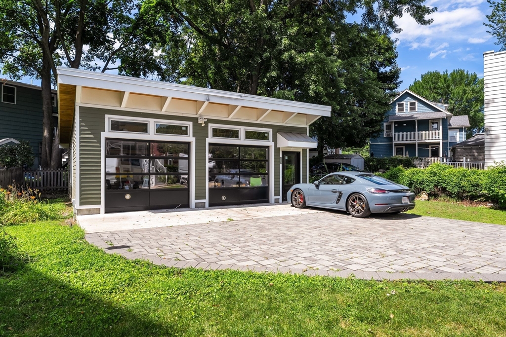 52 Lewis Avenue Arlington, MA 02474 - Photo 35 of 40 a view of a car parked in front of house