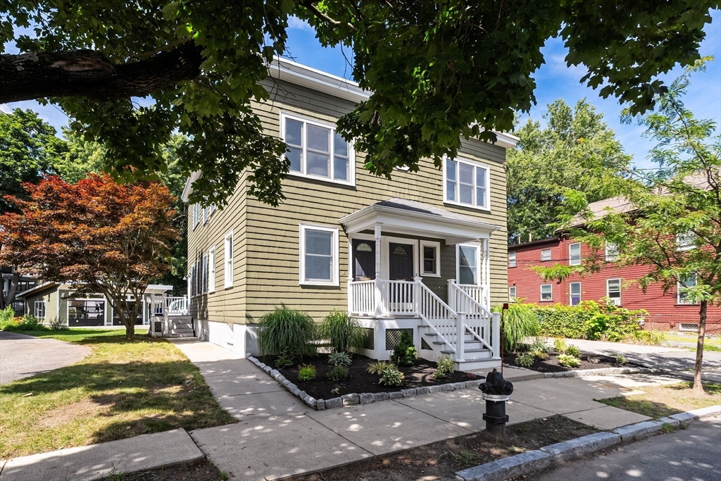 52 Lewis Avenue Arlington, MA 02474 - Photo 40 of 40 a front view of a house with garden