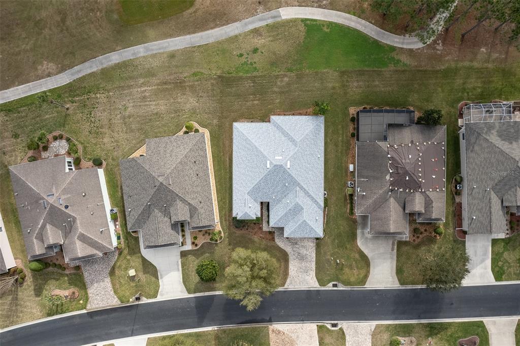 15969 Southwest 14th Avenue Road Ocala, FL 34473 - Photo 43 of 46 an aerial view of a residential houses with outdoor space