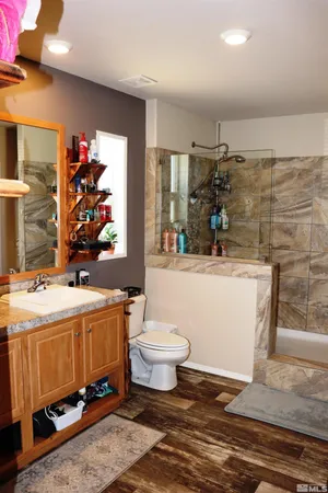 a living room with a couch and a flat screen tv