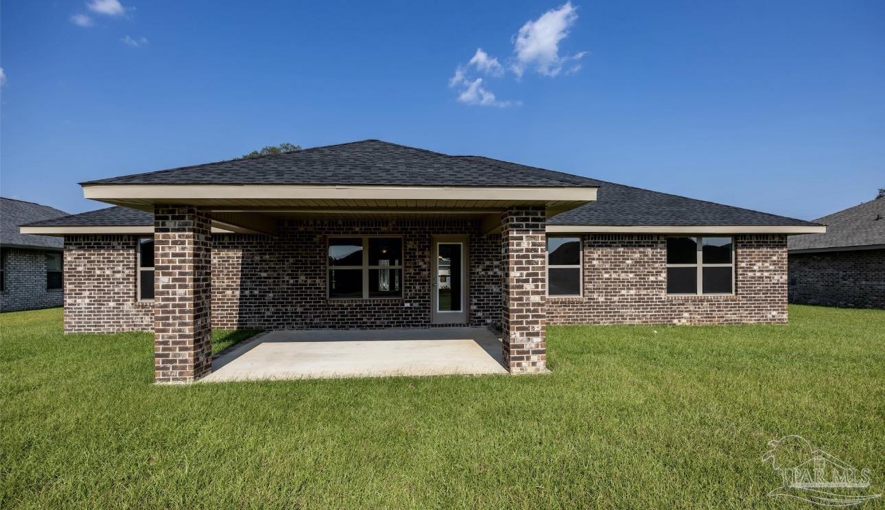 7645 Small Pnes Street Milton, FL 32583 - Photo 5 of 5 a view of a house with a yard
