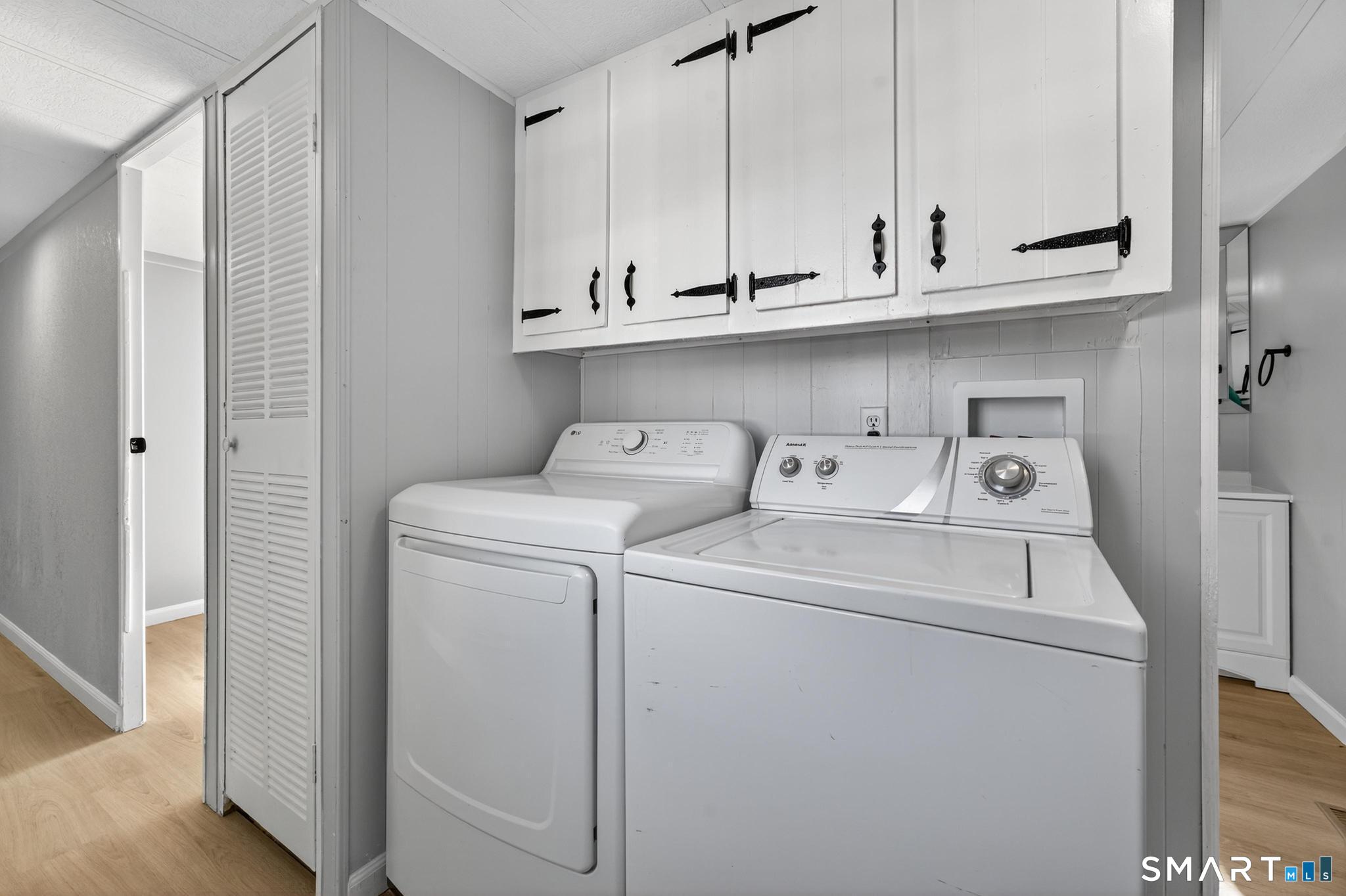 32 Nashua Street Norwich, CT 06360 - Photo 14 of 19 a utility room with dryer and washer