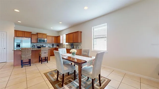 a view of a dining room with furniture