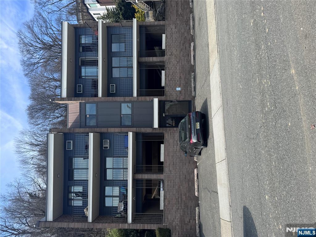 148 Undercliff Avenue, Unit 4 Edgewater, NJ 07020 - Photo 6 of 6 a car parked in front of a building