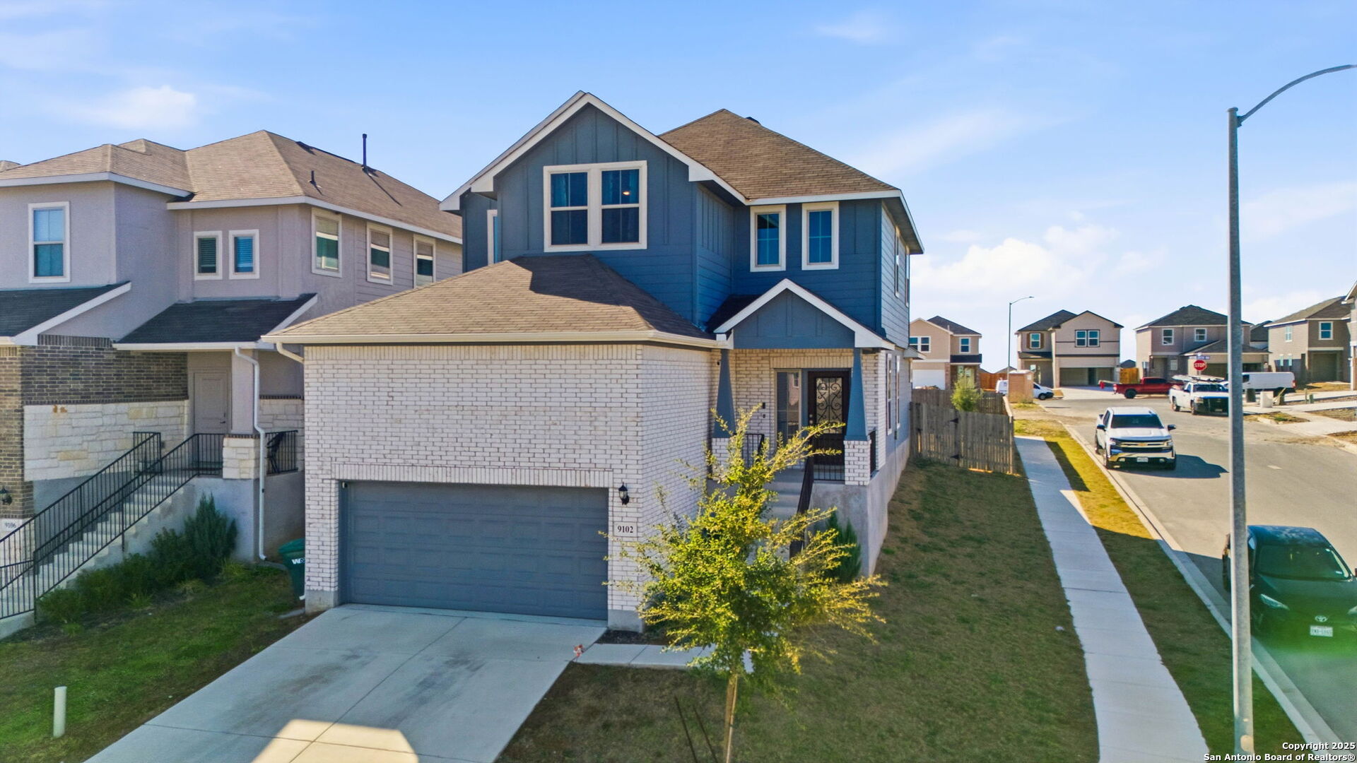 9102 Devils River Converse, TX 78109 - Photo 28 of 34 a front view of a house with a yard