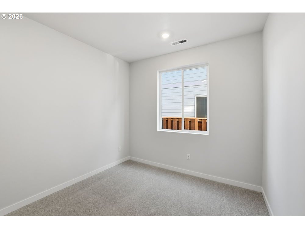 436 Southwest 32nd Street Battle Ground, WA 98604 - Photo 12 of 14 a view of an empty room with a window
