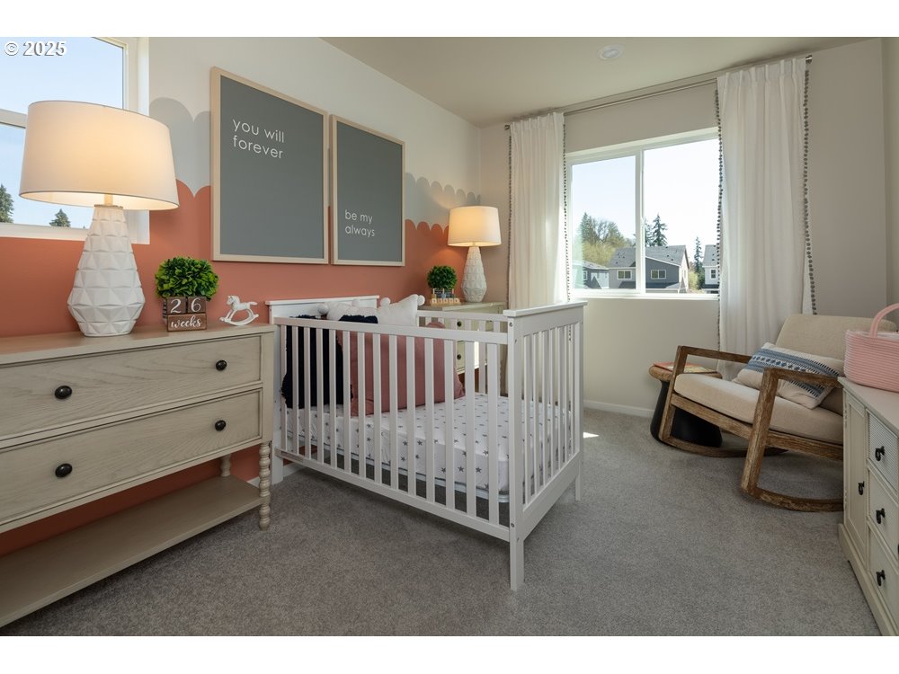 436 Southwest 32nd Street Battle Ground, WA 98604 - Photo 4 of 14 a bedroom with furniture and a window