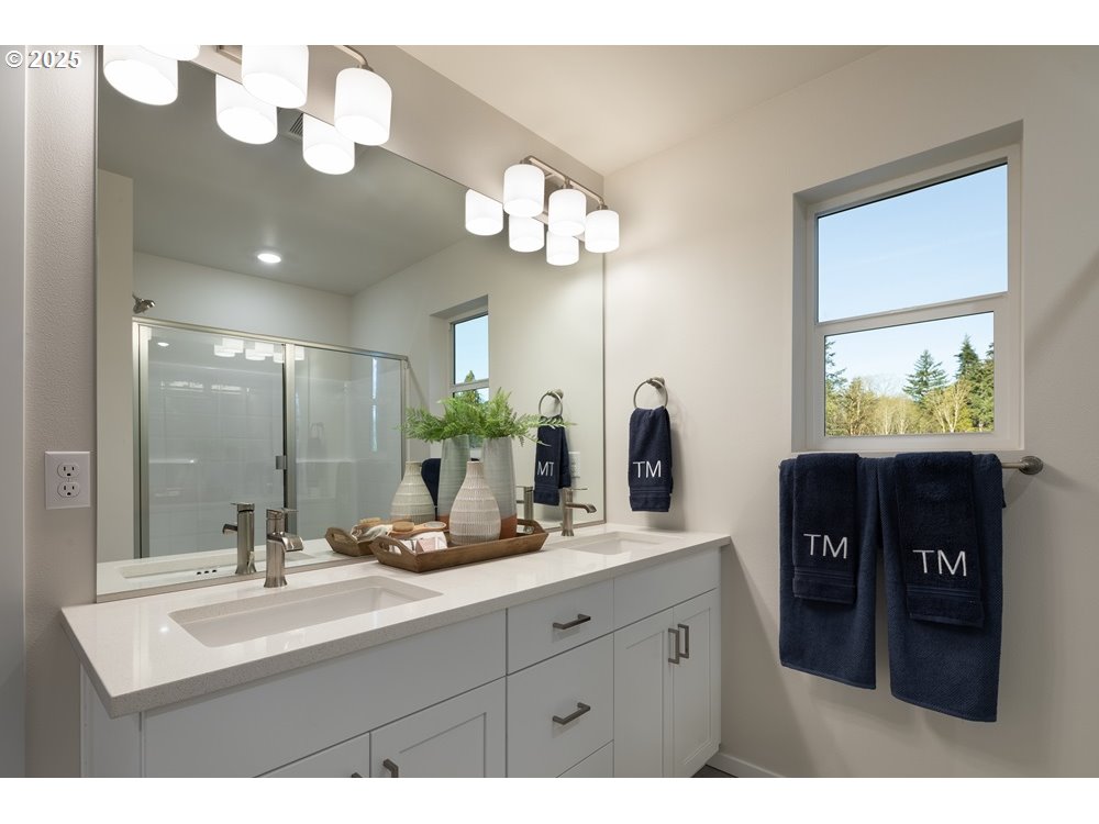 436 Southwest 32nd Street Battle Ground, WA 98604 - Photo 10 of 14 a bathroom with a sink and a mirror