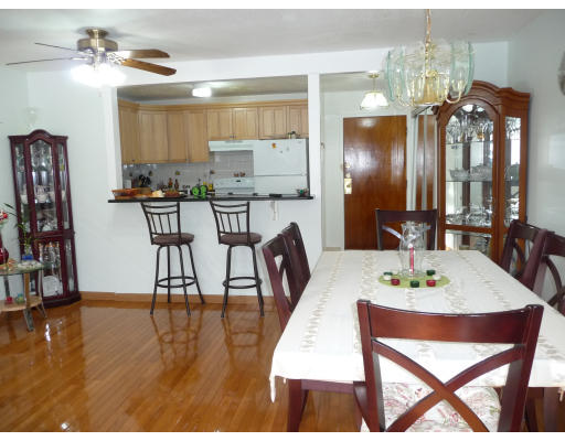 15 Weld Street, Unit 46 Framingham, MA 01702 - Photo 5 of 11 a view of a dining room with furniture and wooden floor
