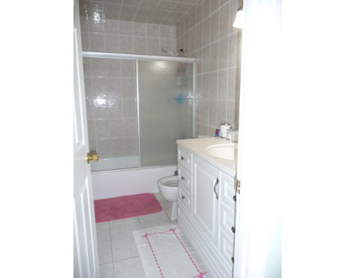 15 Weld Street, Unit 46 Framingham, MA 01702 - Photo 10 of 11 a bathroom with a sink and a mirror