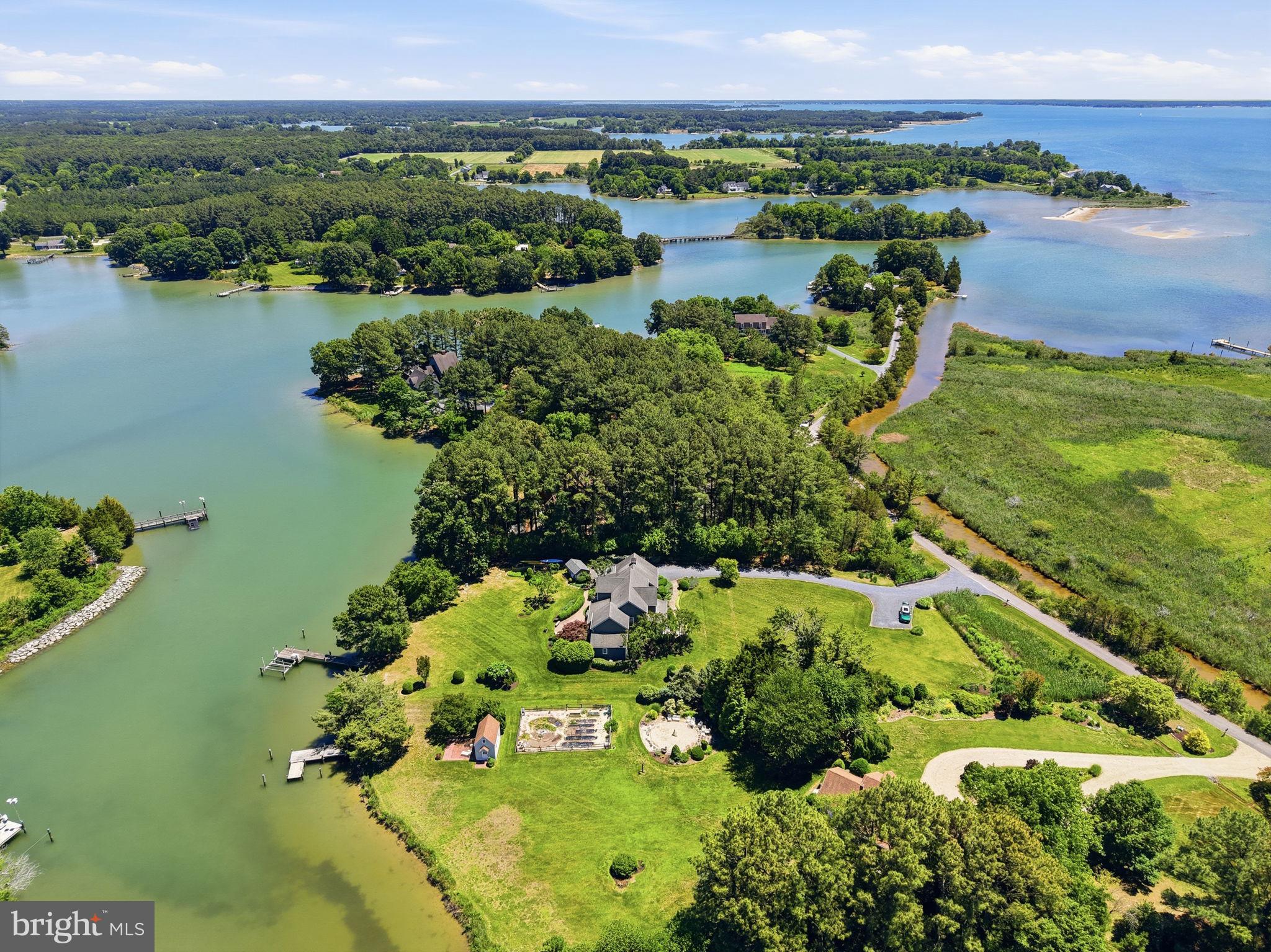 26226 Langs Landing Road Oxford, MD 21654 - Photo 3 of 48 an aerial view of lake houses with outdoor seating