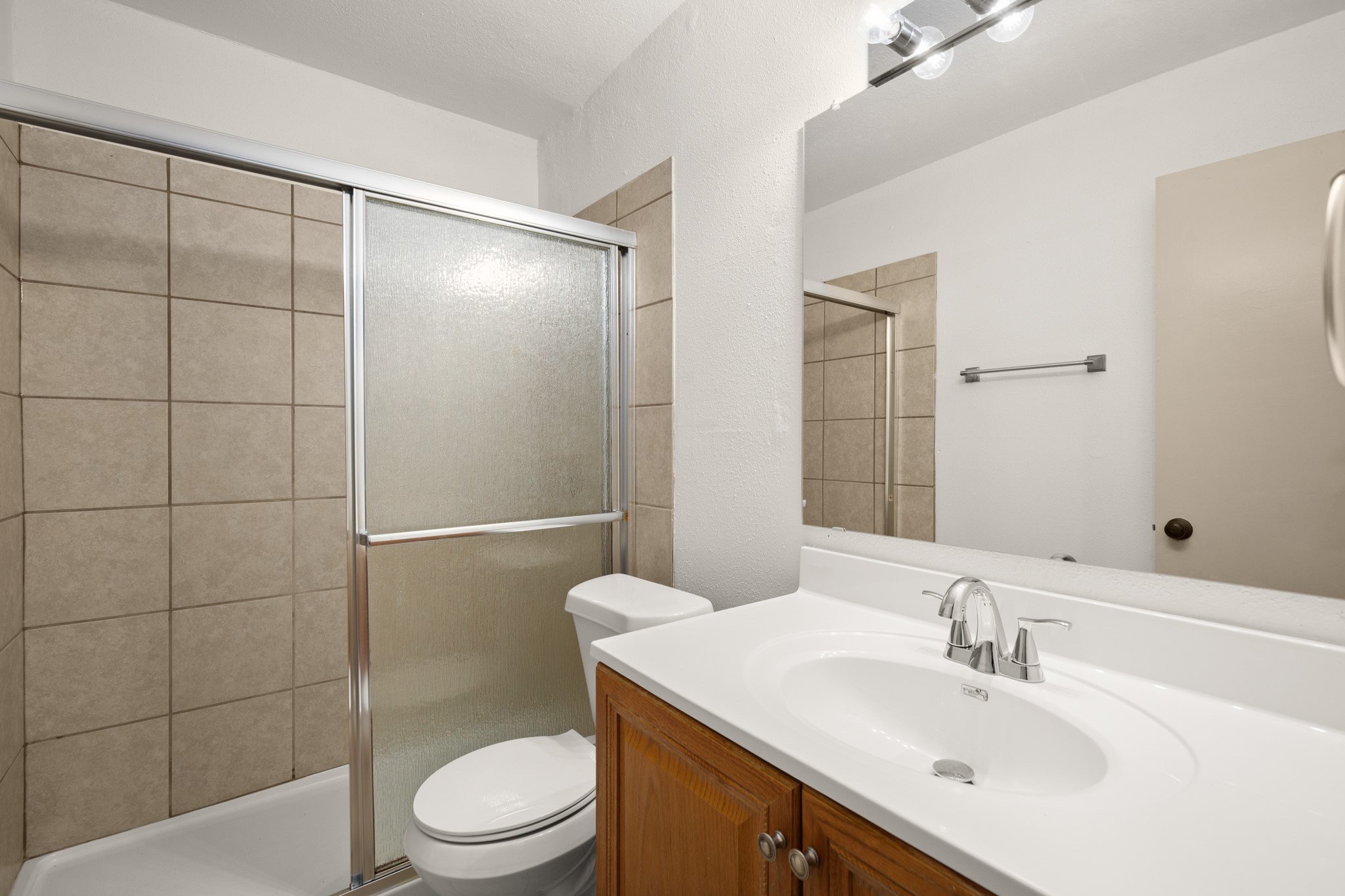 1010 West 23rd Street, Unit 3 Austin, TX 78705 - Photo 14 of 15 a bathroom with a sink a toilet and shower