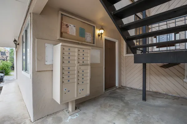 a view of an entryway with wooden door