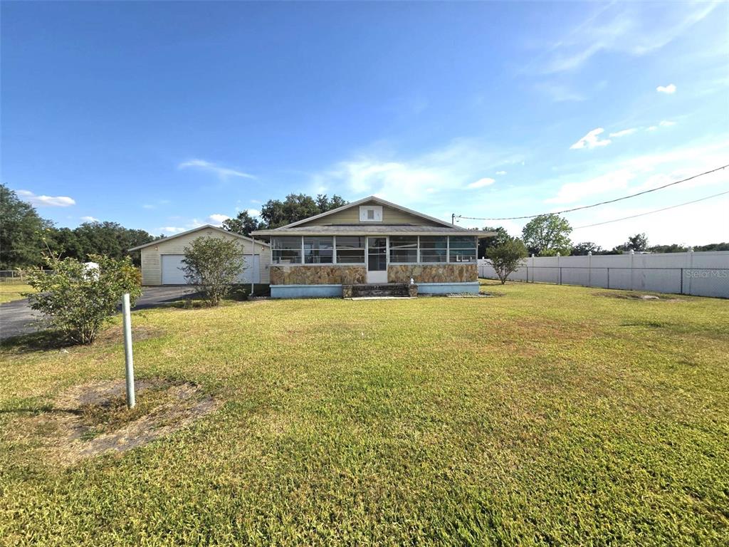 3101 Medulla Road Plant City, FL 33566 - Photo 18 of 83 a view of a house with a yard
