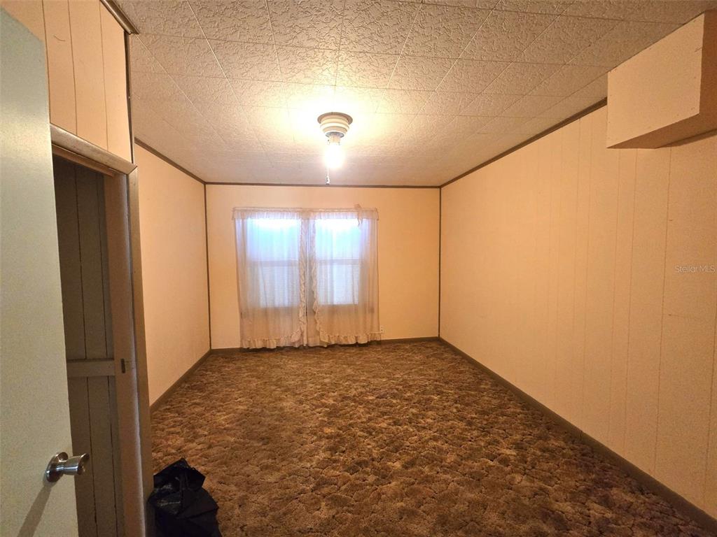 3101 Medulla Road Plant City, FL 33566 - Photo 26 of 83 an empty room with windows
